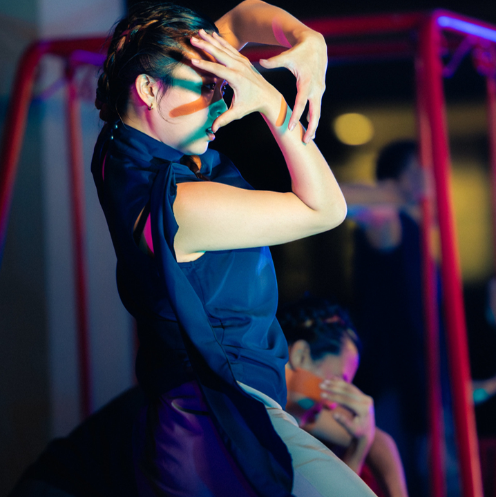Image of a Dance Ensemble member performing at an event